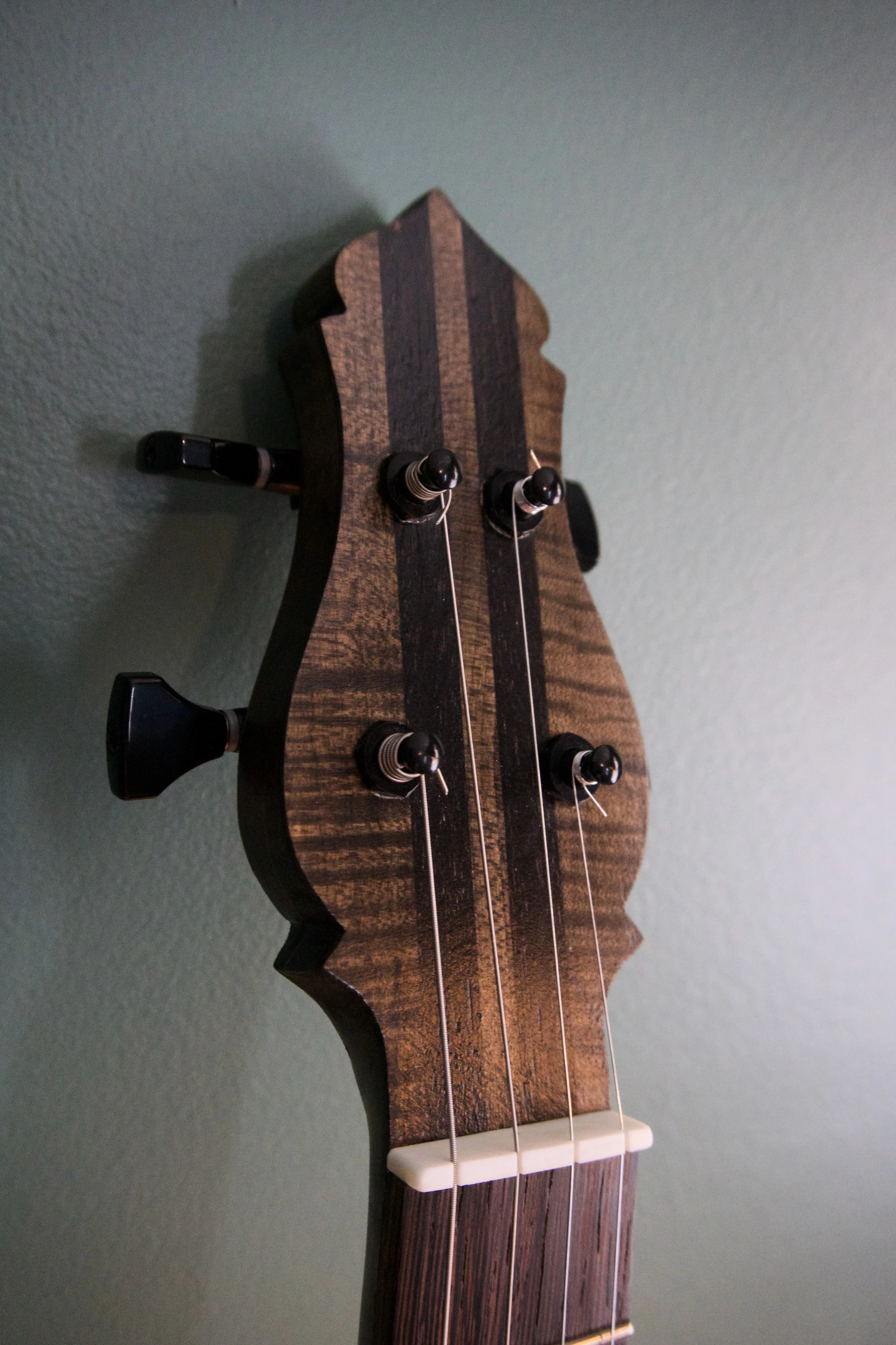 Coffee can banjo, headstock