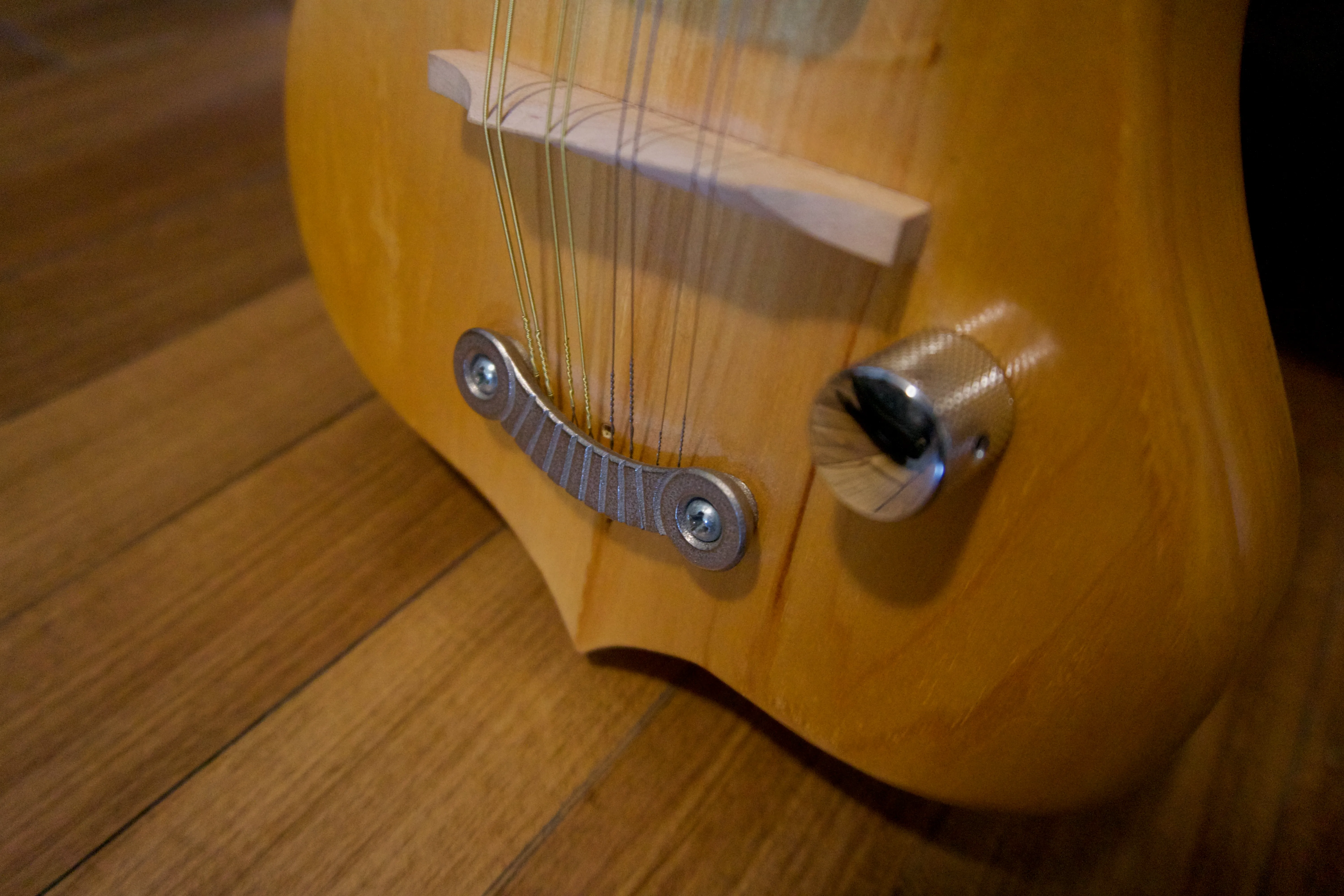 Basswood electric mandolin tailpiece